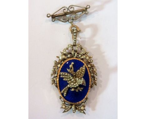 Victorian blue enamel and seedpearl pendant surmounted by silver-coloured model of a bird, set with seedpearls and having rub