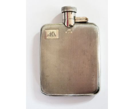 Early 20th century silver hip flask of engine turned decoration, engraved initials having a screw hinged lid, Birmingham 1926