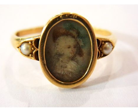 Victorian gold-coloured metal, marked 18, miniature ring, the oval miniature flanked pearl inset shoulders 