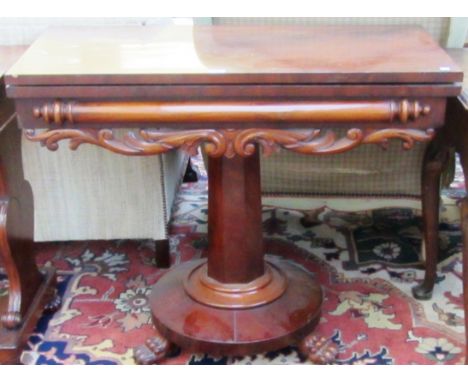 A William IV rectangular mahogany tea table on circular base and three lions paw feet, 94cm wide. 