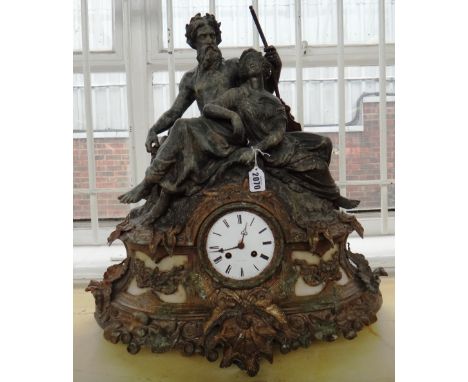 A patinated spelter figural mantel clock, early 20th century, surmounted with classical figures over a gilt spelter and hards