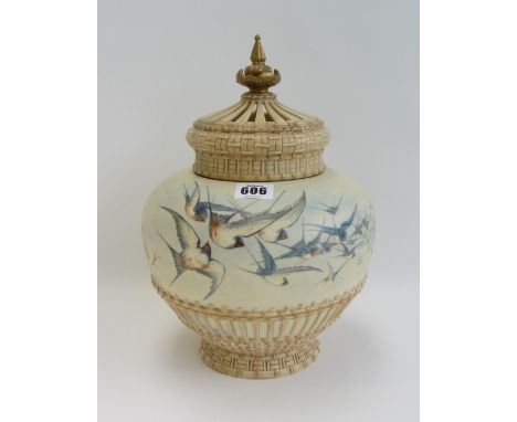 A Royal Worcester pot pourri jar and cover, 1880's, of globular shape with basket moulding to the lower section, painted with
