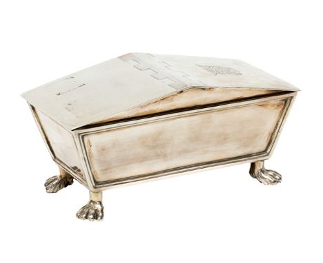 A George III silver twin compartment table snuff box, of hinge lidded sarcophagus form, raised on four paw feet, one of the c