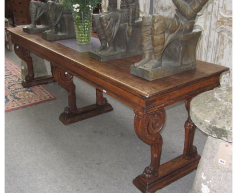 A 19th century French oak dining/hall table with single frieze drawer on six lions paw supports, 252cm wide x 71cm deep. 