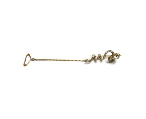 A gold and rose diamond set brooch, designed as a coiled snake, mounted with the principal rose cut diamond to the snake's he