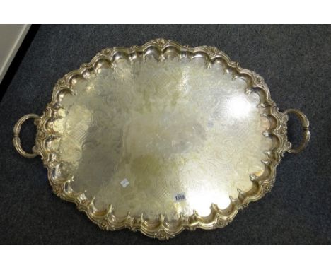 Plated wares, comprising; a large shaped oval twin handled tray, with floral motifs to the scrolling border, otherwise with e