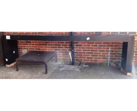 A 20th century hardwood console table on slab end supports, 336cm long x 50cm wide. 