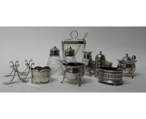 Silver, comprising; a napkin ring, Sheffield 1929, a mustard pot, a salt and a pepperette, (the top lacking), Sheffield 1928,