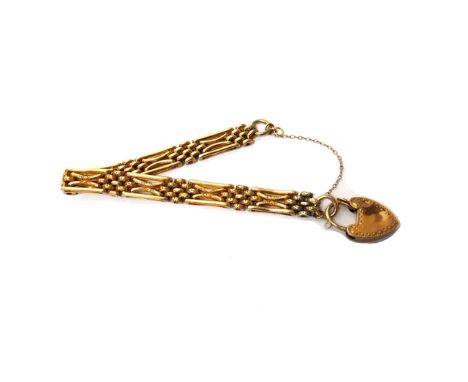 A gold oval, bar and curved bar link decorated and plain gate bracelet, with a gold heart shaped padlock clasp, detailed 9 C,