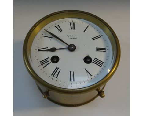 A French brass cased drum carriage clock, late 19th century, the enamel dial indistinctly marked 'xxxxx Oxford St, London', w