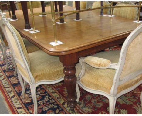 A Victorian mahogany rectangular extending dining table on six turned supports, with one extra leaf, 123cm wide x 138cm long 