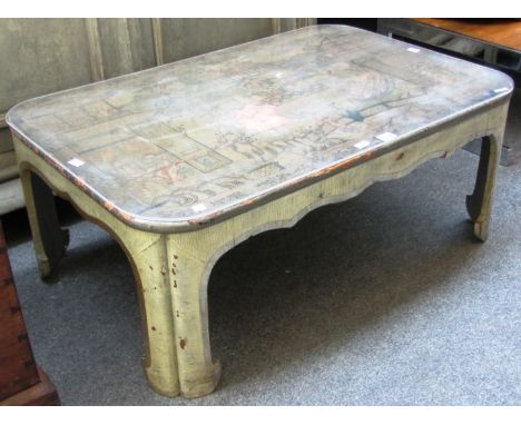 A 19th century and later Chinese polychrome decorated rounded rectangular coffee table on shaped block supports, 92cm wide. 