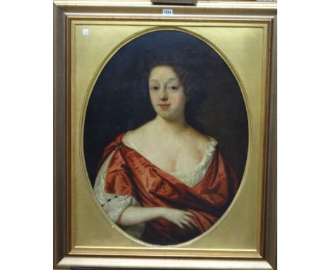 Follower of Sir Peter Lely, Portrait of a lady, oil on canvas, oval, 73cm x 55cm.  Illustrated
