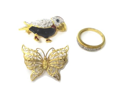 A 9ct gold and diamond set ring, formed as a row of seven small clusters, mounted with circular cut diamonds, a 9ct gold broo