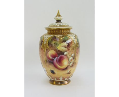 A Royal Worcester pot pourri vase and cover by Terry Nutt, the lobed ovoid body painted with an arrangement of fruit, signed 