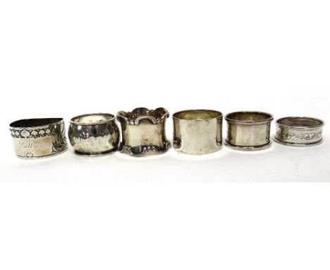 A silver napkin ring, of 'D' shaped form, with Art Nouveau foliate decoration, engraved Sally, Sheffield 1905 and five furthe