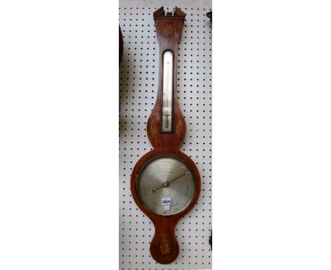 A George III mahogany wheel barometer with broken arch pediment over a thermometer and 8" silvered dial detailed 'P.A. Tarone