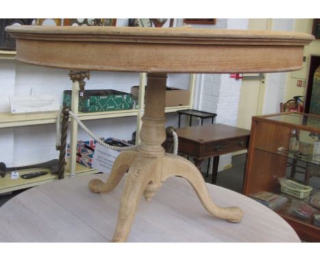 An 18th century style bleached oak circular table on tripod base, 109cm wide. 