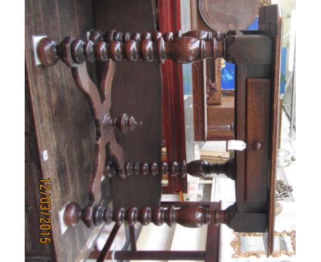 A 17th century style oak single drawer side table on bobbin turned supports and 'X' frame stretcher, 86cm wide. 