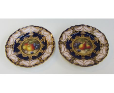 A pair of Royal Worcester plates by Richard Sebright, circa 1923, painted with a central circular panel of fruit, signed R.Se