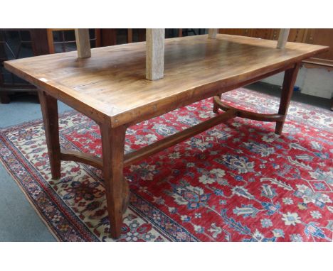 An 18th century style French plank top table on tapering square supports, with crinoline stretcher, 102cm wide x 200cm long.