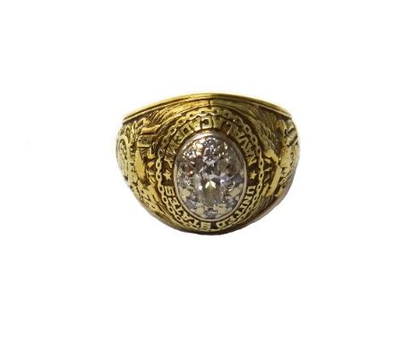 An American gold and diamond set ring, detailed United States Naval Academy, mounted with the principal oval cut diamond at t