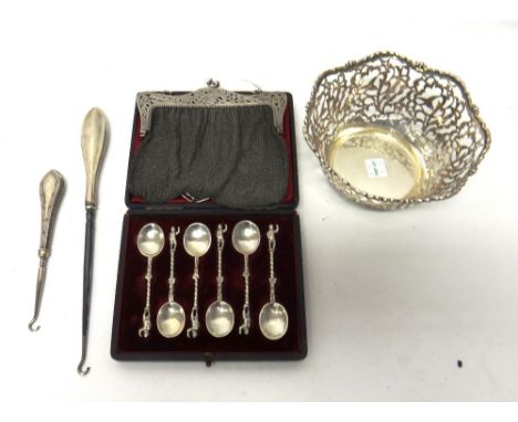 A Sterling bowl, with pierced decoration within a shaped rim, a silver mounted chain mesh lady's evening bag, with pierced an
