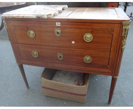 A Louis XVI ormolu mounted tulipwood banded kingwood two drawer commode on tapering turned supports, stamped 'ETIENNE AURIL' 
