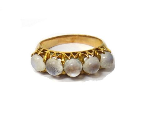 A gold and moonstone set five stone ring, mounted with a row of five cabochon moonstones, ring size K and a half.