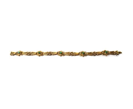A gold and turquoise set bar and oval link gate bracelet, on a snap clasp, detailed 9 CT, gross weight 17.5 gms.