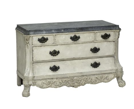 A painted continental 18th century style commode, the ebonised top over three short and two long drawers and carved apron on 