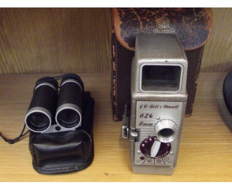 G.B Bell & Howell 624 camera together with some binoculars 