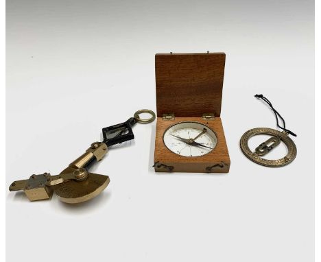 A fruitwood cased pocket compass, 20th century, width 8cm, together with a De Lisles pattern Reflecting Clinometer, stamped '