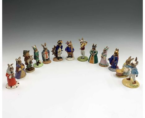 A collection of eleven Royal Doulton 'Bunnykins' figures comprising 'Robin Hood', 'Maid Marion', 'King Richard', 'Queen Guine