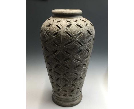 A large Indian ceramic vase. Height 74cm.