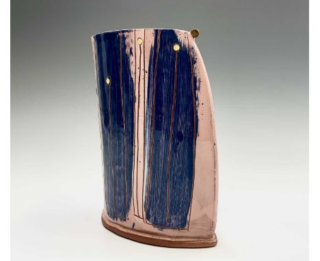 Linda Styles, A contemporary ceramic vessel, the pink ground decorated with vertical blue stripes and yellow dots, signed, he