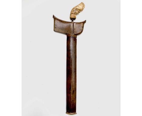 A Javanese Kris, 19th century, with carved ivory garuda bird hilt, wavy blade and ivory tipped scabbard, length 46.5cm.