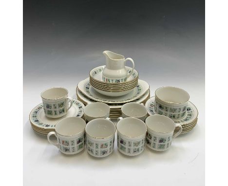 A Royal Doulton 'Tapestry' pattern dinner and tea service comprising six dinner plates, six dessert bowls, seven tea cups, se