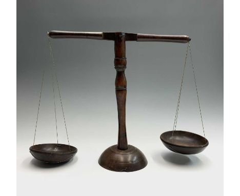 A set of elm and sycamore butter or dairy scales, West country or Wales, mid 19th century, with turned beam and column on a d