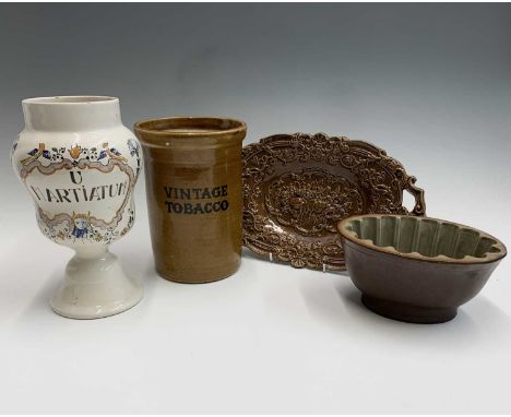 An Ogden's of Liverpool retailers stoneware tobacco jar, inscribed 'Vintage Tobacco', height 20cm, together with an earthenwa