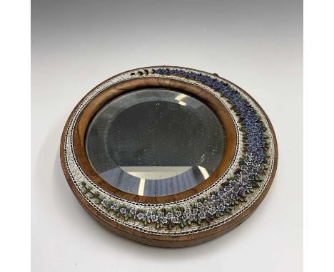An Italian olive wood easel mirror, late 19th century, with a crescent shaped millefiori micro mosaic inlaid surround decorat