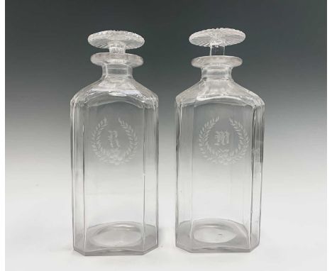 A pair of 19th century cut glass decanters, with mushroom stoppers, engraved 'R' and 'W' within a wreath. Height 23cm.Provena