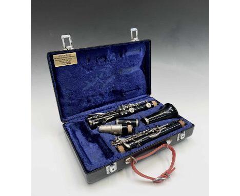 A Boosey &amp; Hawkes Regent model B flat composition clarinet, number 445547, in hard case.