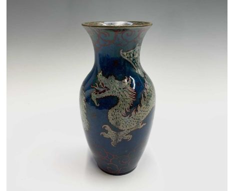 A Pilkington's Lancastrian lustre vase, painted with a dragon on a blue ground, height 22cm.Condition report: Restored.There 