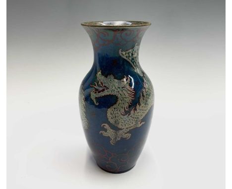 A Pilkington's Lancastrian lustre vase, painted with a dragon on a blue ground, height 22cm.Condition report: Restored.There 