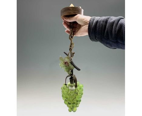 An early 20th century metal and Murano glass hanging light fitting, in the form of a bunch of grapes on a vine. Height 45cm. 