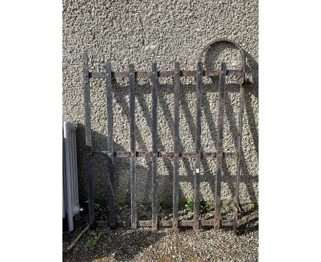 A wrought iron garden gate. Maximum height 108cm, maximum width 99cm.