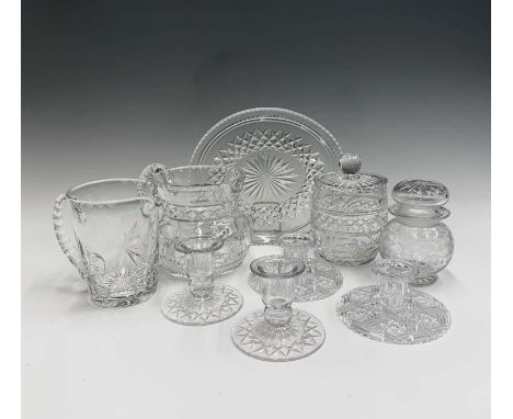 A cut glass preserve pot and cover with acid etched vine decoration, an Edinburgh Crystal jug, another cut glass jug, a biscu