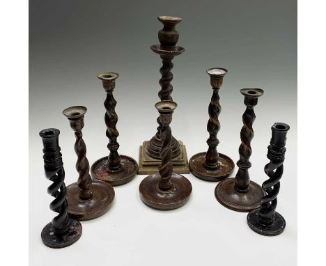 Three pairs of barley twist stem candlesticks, height 31.5cm diminishing, one large barley twist stem candlestick, height 44c