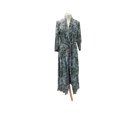 Two long vintage dresses, one wrap around style in silk feel floral fabric, the other in plaid patterns with sequins. Un labe